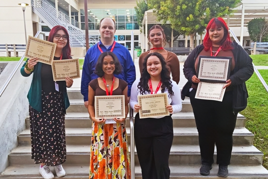 six citrus college journalism students pose on outdoor steps, several holding certificates from the journalism association of community colleges socal regional conference