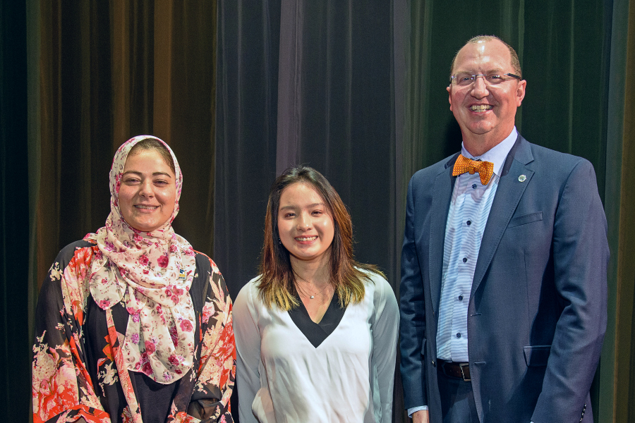 photo of Areej Qasqas, part-time faculty, Jessie San, and superintendent/president Greg Schulz