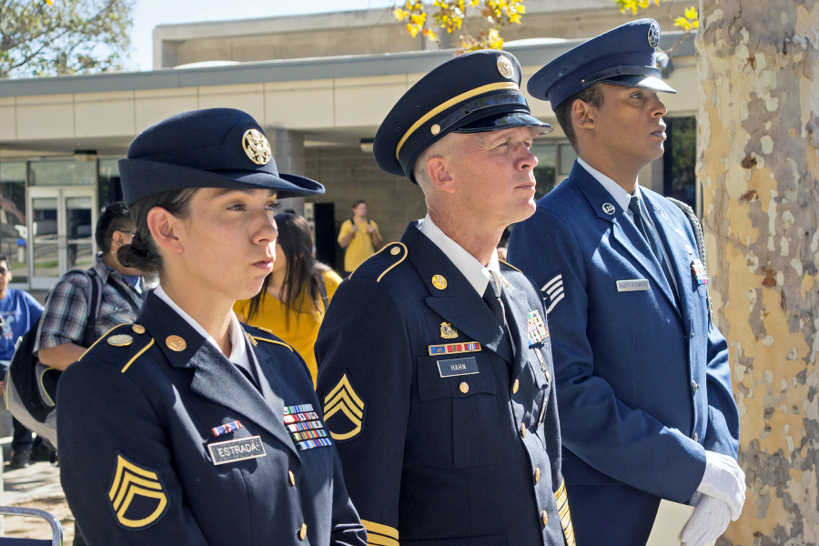three service members stand in uniform during a citrus college event recognizing support for student-veterans and military students