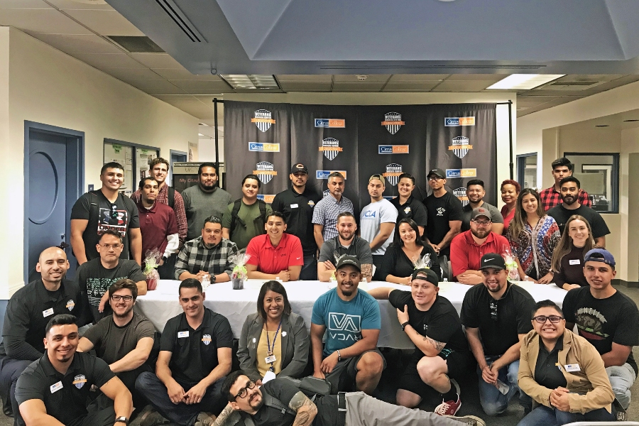 citrus college student-veterans and staff pose together during a veterans success center gathering